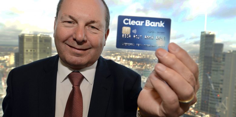 Nick-Ogden-holding-card-at-ClearBank-press-launch-3-779x389.jpg